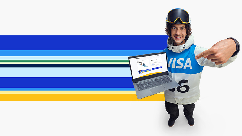 athlete holding laptop with olympic stripes